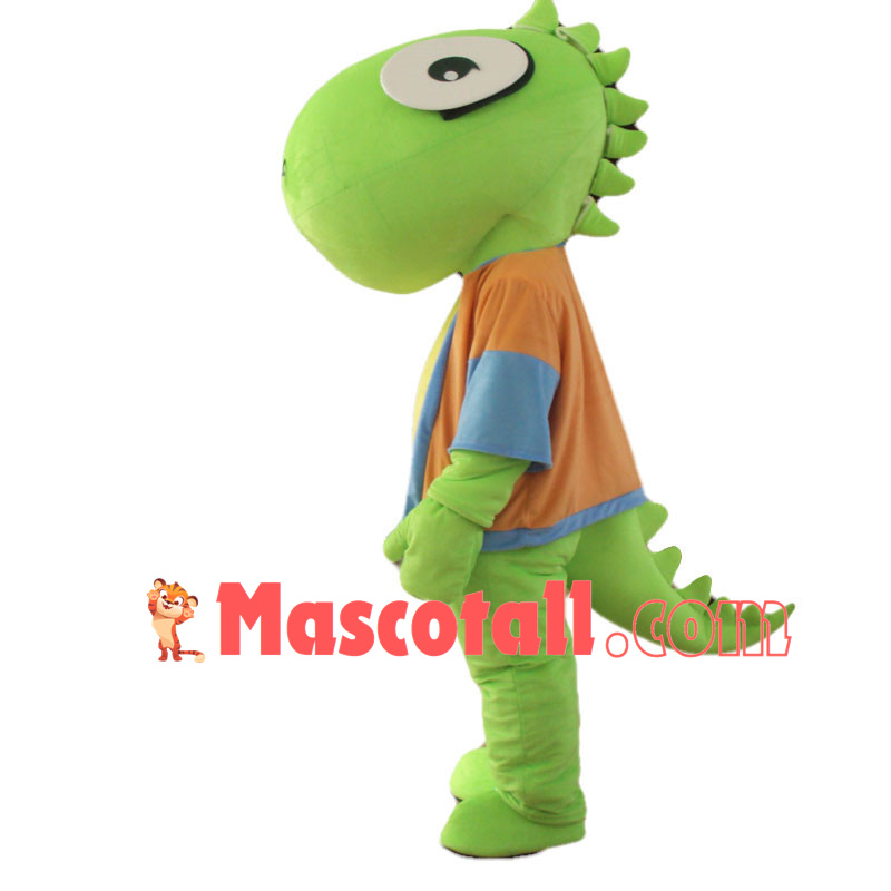 Cartoon Green Dinosaur In Orange Coat Mascot Costume	